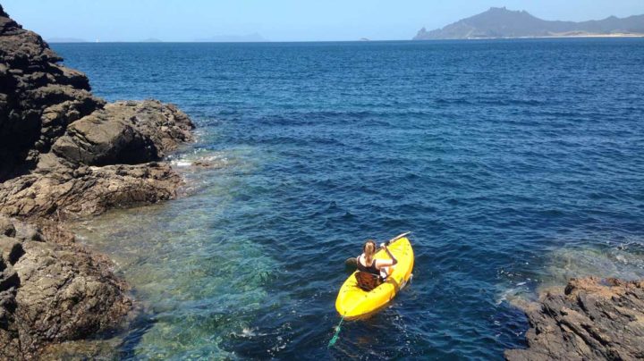 Explore the coastline by kayak